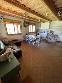 Cabin house surrounded by deers and forest - Image 3