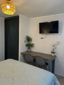 Modern apartment steps from Movistar Arena and Caupolitan - Image 4