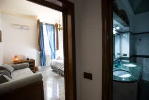 Spacious Design Suite with Jacuzzi & AC - Image 3