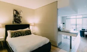 Studio Apartment With Roof Top View - Image 5