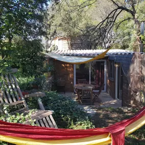 Cottage against the rock, on wooded land. - Image 2