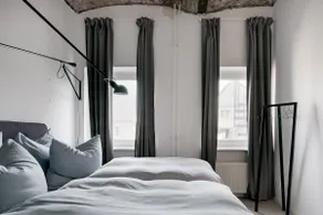 Tasteful loft with vibrant art - Image 4