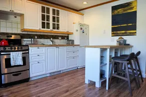 Cozy Creekside Two-Storey Condo - Image 2