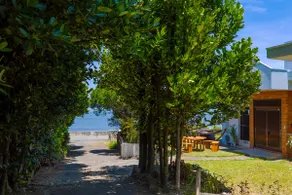 In front of you is the beach where sea turtles come to lay their eggs! Sunset Ocean view BBQ in the Fukugi trees of Bise! - Image 5