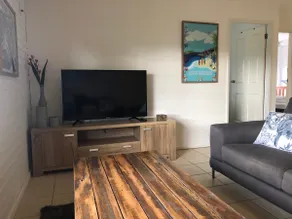 2BR Beachside oasis with pool & playground - Image 5