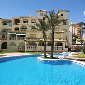 Charming beachfront apartment with a pool - Image 4