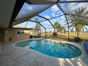 Sunny Florida Retreat 3BR, 2BA Heated Pool - Image 4