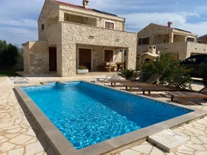 Stone house villa with an electric vehicle charging station - Image 3