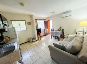 Apartment surrounded by beautiful gardens and a pool - Image 4