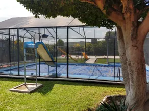 A vacation home with a pool and a hot tub - Image 4