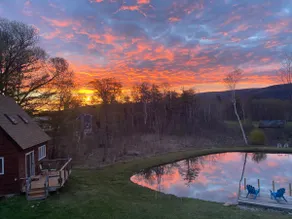 Home with a spring-fed pond and mountain view. - Image 3