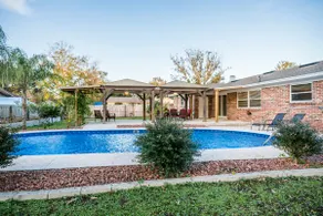 Stunning Modern Oasis with a Huge Pool - Image 4