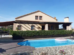 A rural house with a swimming pool and surrounded by nature - Image 3