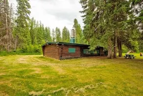 Rustic 1950's Cozy Creekside Log Cabin on 10 Acres - Image 4
