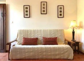 Orange Farmhouse, Apartment with king bed and sofa. - Image 4