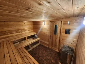 Rustic cabin with hot tub and sauna on the lake - Image 4