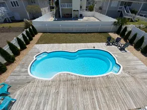 FULLY RENOVATED: pool, walk to beach, water views! - Image 2