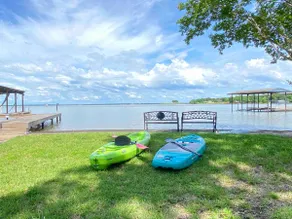 Open water view: cozy hot tub & fire pit with dock - Image 5