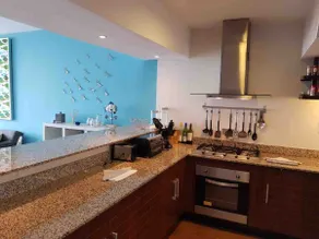 A beautiful apartment with a pool and ocean views - Image 4