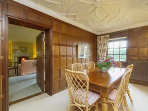 Historic manor house surrounded by mature gardens - Image 5