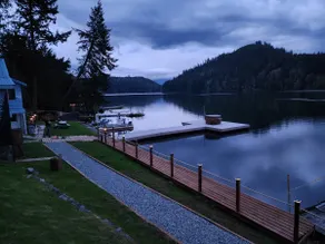 Rustic cabin with hot tub and sauna on the lake - Image 5