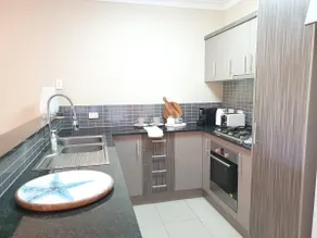 Tropical Retreat with 9 Pools Gym and BBQ Access - Image 4