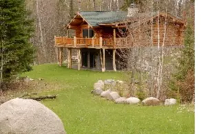 Log lodge in crystal clear lake in the Chippewa. - Image 2