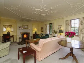 Historic manor house surrounded by mature gardens - Image 3