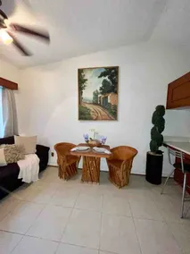 A beautiful condominium with a pool - Image 4