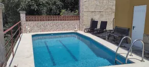 2 bedroom mountain retreat with pool and sea views - Image 2