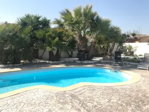 A villa with a swimming pool and a 1,200-square-meter private garden. - Image 3