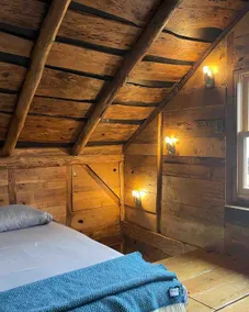 Adorable wood cabin with indoor fire-pit and sauna - Image 2