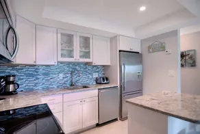 Direct Ocean steps to beach. Private end unit! - Image 5