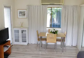Clean, queen bed with cooking facilities. - Image 3