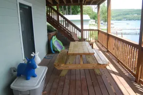 Rare Find! 140' Lake Frontage w dock & boat hoist - Image 4
