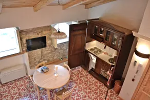Cozy penthouse in old village - Image 4