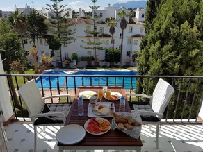 Sunny apartment with pool and sunset view - Image 3