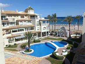Charming beachfront apartment with a pool - Image 5