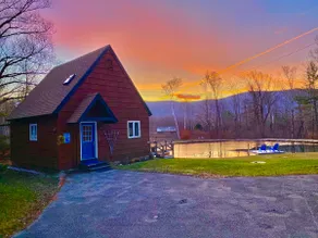 Home with a spring-fed pond and mountain view. - Image 4