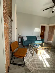 Historic Red Brick Home with Patio & Full Kitchen - Image 4