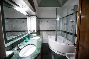 Spacious Design Suite with Jacuzzi & AC - Image 2