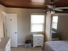 Coral Beach Cottage #1 - Sleeps 2 Adults 2 Kids - Image 2