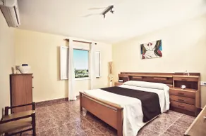 Sunny villa with a pool and garden - Image 5