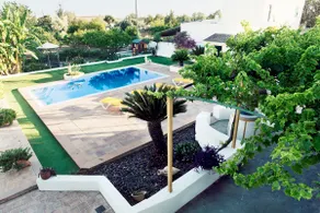 Sunny villa with a pool and garden - Image 3