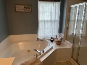 Tranquil Nest - Family Home with Spa Tub - Image 4