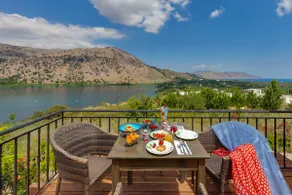 Idyllic landscape with panoramic view of the lake - Image 2