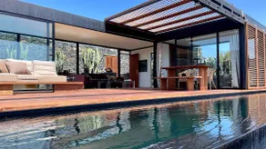 Wake up to nature in this modern glass house - Image 3
