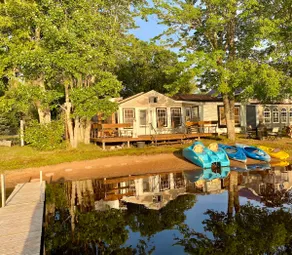 Serene lakefront living. Two bedroom cottage. - Image 2