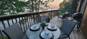 Cozy sunset lake cabin. - Image 2