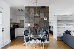 Chill in the Cozy, Cabin-Style Lounge at a Calming Condo - Image 4